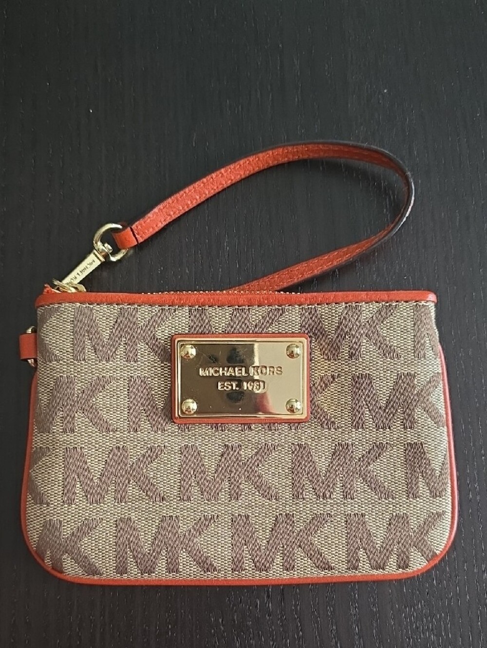 Michael Kors Monogram Wristlet in Brown with Orange Trim